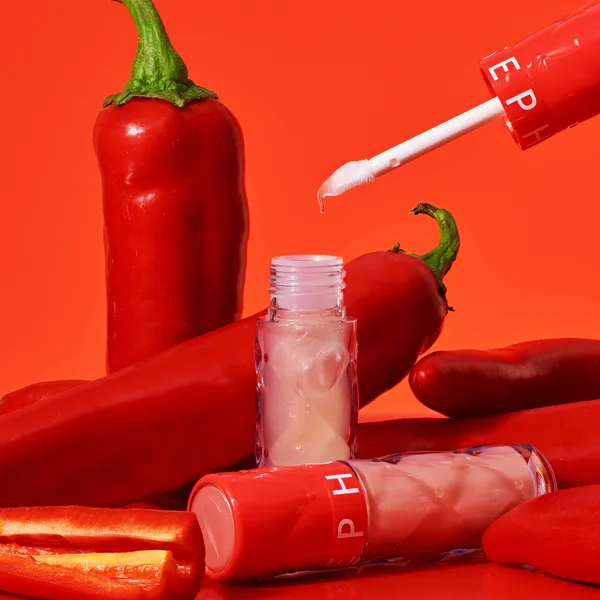 Outrageous Intense Блеск для губ с эффектом увеличения