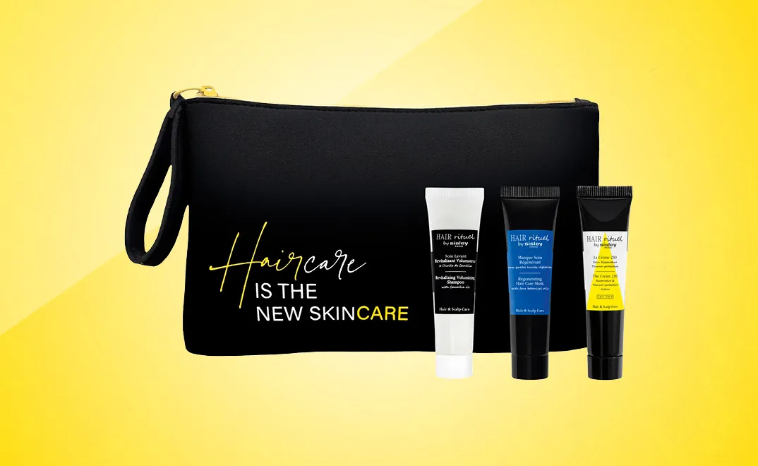 Дарим модную косметичку с 3-я миниатюрами бестселлеров Hair Rituel by Sisley при заказе любого средства из гаммы.